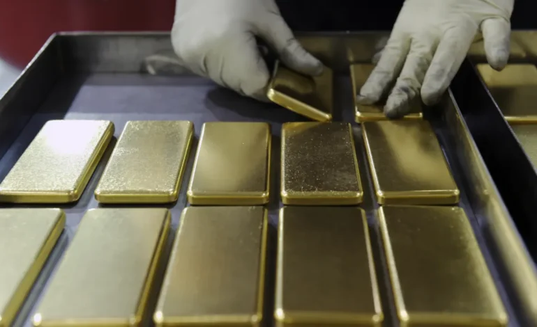 Gold prices fall on firmer dollar
